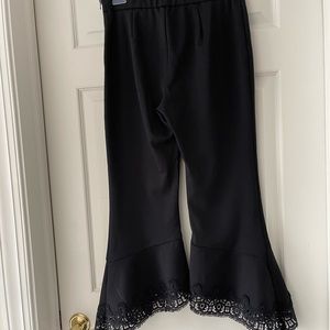 Le Gali size small black bell bottom pants